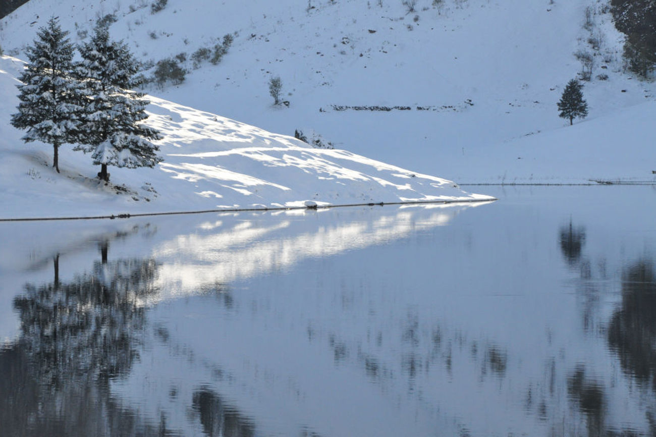 Ein Bergsee ist auch ein Himmelsauge: Wie im Himmel so auf Erden. Foto: Markus Grieder